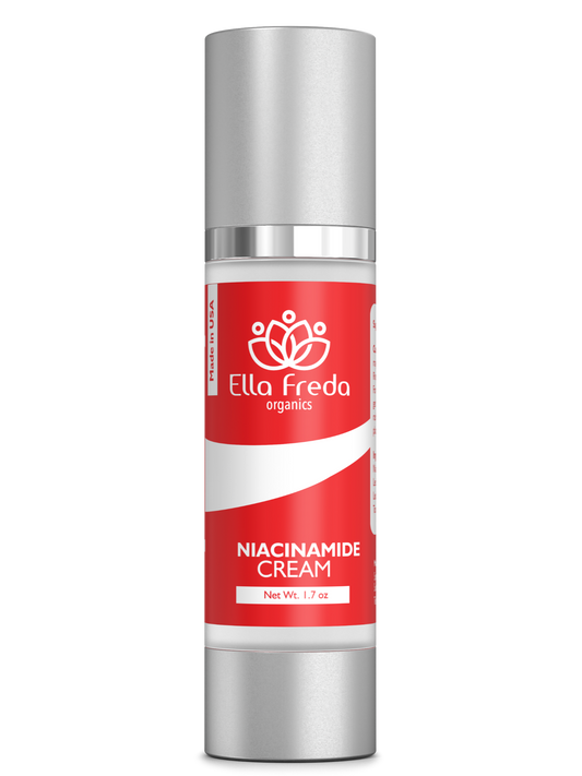 A bottle of Niacinamide Cream by Ella Freda Organics, with a predominantly red label and a silver cap.